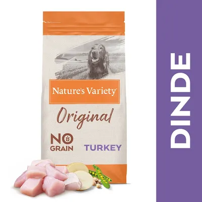 Sac Nature’s Variety Original, texte visible : NO GRAIN, TURKEY, Dinde. Morceaux de dinde, pommes de terre et pois visibles devant l’emballage.