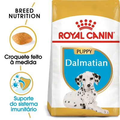 Embalagem de ração Royal Canin Puppy Dalmatian. Texto visível: 'Croquete feito à medida', 'Suporte do sistema imunitário', 'Breed Nutrition'. Imagem de croquete e escudo.
