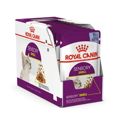 Royal Canin Sensory Smell kattemad, 85 g portionsposer i æske. Synlig tekst: SENSORY SMELL, Feline Health Nutrition. Billede af kat og foderstykker på emballagen.