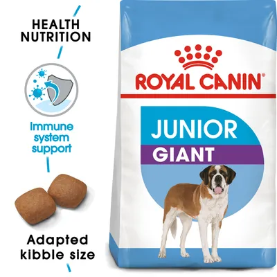 Royal Canin Junior Giant -koiranruokapakkaus, kuvassa myös kaksi nappulaa, tekstit: Health Nutrition, Immune system support, Adapted kibble size. Kuvassa bernhardinkoira. Royal Canin Junior Giant -koiranruokapakkaus, kuvassa myös kaksi nappulaa, tekstit: Health Nutrition, Immune system support, Adapted kibble size. Kuvassa bernhardinkoira.