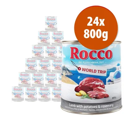 Rocco World Trip, 24 lattine da 800 g ciascuna. Testo visibile: Lamb with potatoes & rosemary. Immagine di carne, patate e rosmarino sulla confezione.