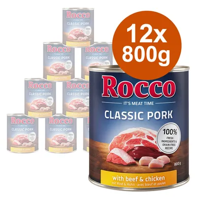 Rocco Classic Pork med nötkött och kyckling, 12 x 800 g burkar. Text: 100 % fresh ingredients & grain-free recipe. Varumärket Rocco synligt på förpackningen.