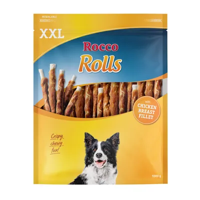Rocco Rolls XXL, palitos con pechuga de pollo, bolsa resellable de 1000 g. Texto visible: Crispy, chewy, fun! Imagen de perro en el envase.