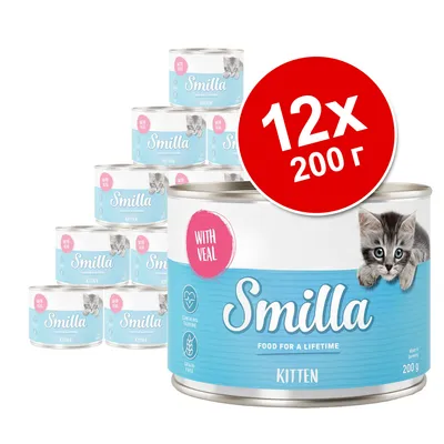 Набор консервов Smilla Kitten с телятиной, 12×200 г. На банке изображён котёнок и надпись WITH VEAL. Видны упаковки с голубой этикеткой.