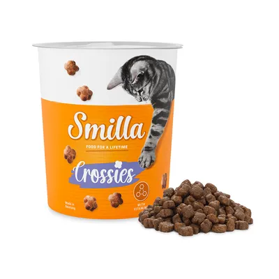 Smilla Crossies, παρασκευάζεται στη Γερμανία, με βιταμίνες. Η συσκευασία δείχνει γάτα και σνακ σε σχήμα αστεριού.