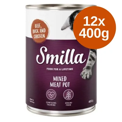 Smilla Mixed Meat Pot, manzo, anatra e pollo, 12x400g. Contiene taurina, grain-free. Testo in inglese: 'Food for a lifetime', 'Contains taurine', 'Grain-free'.