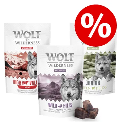 Wolf of Wilderness Wild Bites: High Valley Mini, Wild Hills, Junior Green Fields. Frisches Fleisch, getreidefrei. Prozentzeichen für Rabattaktion sichtbar.