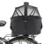 Schwarze Fahrradbox mit Netzabdeckung, montiert auf einem Gepäckträger. Geeignet für den Transport kleiner Tiere oder Gegenstände.