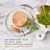 An exquisite paté to spoil her sophisticated palate. Text on image with a round portion of paté on a white plate, parsley garnish, and a fork visible.