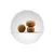 Trois croquettes rondes marron présentées sur fond blanc, montrant la forme et la taille du produit.