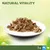 Assiette de bouchées en sauce, texte visible : NATURAL VITALITY, pictogrammes animal et volaille, indication 1+ an. Aucun emballage ou marque supplémentaire visible.