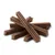 Brown star-shaped chew sticks arranged in a pile, showing the product’s texture and shape for easy identification.