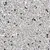Close-up of grey and white granules, showing the texture and composition of pet litter or absorbent material.