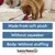 Dog with plush toy. Text: Made from soft plush, Without squeaker, Body: Without stuffing. Brand: beeztees. Dog with plush toy. Text: Made from soft plush, Without squeaker, Body: Without stuffing. Brand: beeztees.
