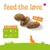 Drei Futterstücke mit Schild '100% løve', Text 'feed the løve'. Größentabelle: Länge 22 mm, Durchmesser 10 mm, Höhe 7 mm.