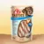 8in1 Tasties Twisters, snack con petto di pollo e merluzzo, facilmente digeribile, senza zuccheri aggiunti, 85g. Confezione mostra snack intrecciati e cane.