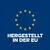 Hergestellt in der EU, umgeben von einem Kreis aus gelben Sternen auf blauem Hintergrund.