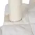 Cat tree with sisal-wrapped posts and soft white plush base.