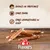 8in1 Flavours – riches en protéines, sans sucre, sans exhausteurs de goût. Bâtonnets à mâcher visibles sur une table en bois.