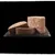 Sliced portions of firm, pate-style pet food displayed on a dark stone surface, showing texture and consistency.