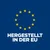 Made in the EU. Text with yellow stars in a circle on a blue background.