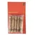 Paquet de bâtonnets à mâcher TIAKI Husk Chewies, 6 pièces en bois ficelées, emballage avec texte anglais visible sur fond orange.