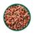 Tray with wet food, visible meat pieces, peas, diced carrots and rice in gravy.