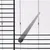 Close-up of a grey plastic perch mounted on a black metal cage with bars.