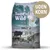 Taste of the Wild hundefoder, Sierra Mountain Canine Formula with Roasted Lamb. Stor cirkel med teksten UDEN KORN. Tekst: A grain-free diet. Purified water. Billede af ulve og får.