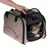 Sac de transport beige Tiaki avec poignée, ouvert sur le dessus, contenant un chat tigré. Aérations latérales visibles, fermeture éclair et maille noire sur l’ouverture.