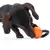 Hund leger med orange legetøj formet som en håndvægt med håndtag.