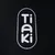 Tiaki. Markenname auf schwarzem Hintergrund.