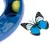 Blue toy with yellow ball and butterfly on wire, suitable for interactive play.