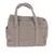 Sac de transport en tissu effet laine bouclée beige, deux anses, fermeture zippée sur le dessus, poche latérale visible.