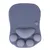 Tapis en silicone gris en forme de patte avec cinq reliefs ronds et un relief central en forme de cœur, sans marque visible ni texte.