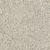 Close-up view of light-coloured granules, showing the texture and size of the product material.