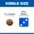 Kibble size shown as 9 by 3.5 millimetres next to a dice measuring 16 millimetres for comparison.