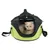 Sac de transport vert et noir avec un chat beige à l’intérieur, ouverture frontale zippée, poignée et bandoulière visibles.
