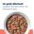 Un goût alléchant auquel les animaux ne résistent pas. Bol de nourriture humide avec morceaux de viande, carottes et petits pois visibles.
