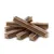 Several brown, star-shaped chew sticks stacked together.