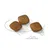 Three square-shaped kibble pieces shown next to a 1cm scale for size reference.