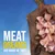 Holzbrett mit rohen Fleischstücken. Text: Meat Dreams Are Made Of This!