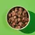 Bowl filled with brown, cube-shaped pet food pieces, shown from above to display product texture and portion size.