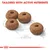 Four ring-shaped kibble pieces shown with a 1cm scale and the text 'Tailored with active nutrients' above.