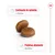 Pienso con texto: 'Combinación de nutrientes y vitaminas' y 'Proteínas altamente digestibles'. Dos croquetas marrones visibles en el centro. Pienso con texto: 'Combinación de nutrientes y vitaminas' y 'Proteínas altamente digestibles'. Dos croquetas marrones visibles en el centro.