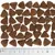 Triangular brown kibble pieces shown next to a ruler in centimetres for size reference.