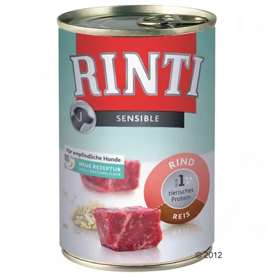 RINTI Sensible, Rind, Reis. Na etykiecie: Für empfindliche Hunde, Neue Rezeptur noch bekömmlicher, nur 1 tierisches Protein. Widoczne kawałki mięsa i ryżu.
