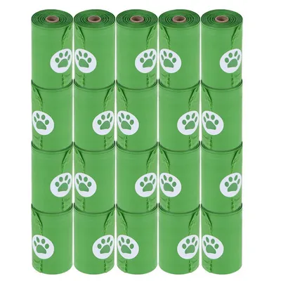 Zestien groene rollen hondenpoepzakjes met wit pootafdruk-symbool zichtbaar op elke rol.