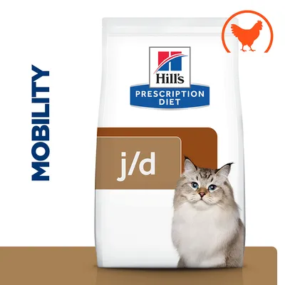 Hill's Prescription Diet j/d macskaeledel csomagolás, barna-fehér alapon cicával, MOBILITY felirat és narancssárga csirke szimbólum látható. Hill's Prescription Diet j/d macskaeledel csomagolás, barna-fehér alapon cicával, MOBILITY felirat és narancssárga csirke szimbólum látható.