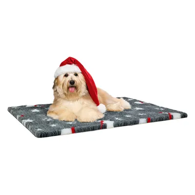 Graue Hundematte mit Weihnachtsmotiv, dekoriert mit roten und weissen Streifen sowie Sternen.